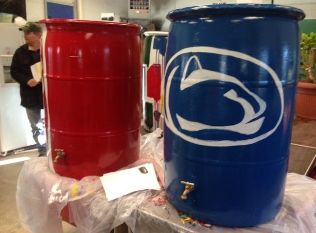 rain barrels painted by students